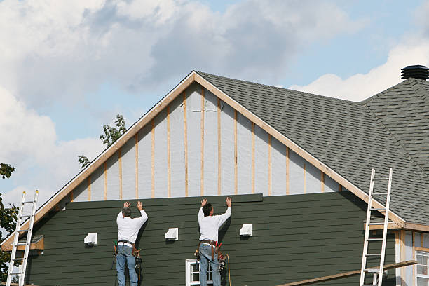Professional Siding Contractor technician working in Centerville, IN